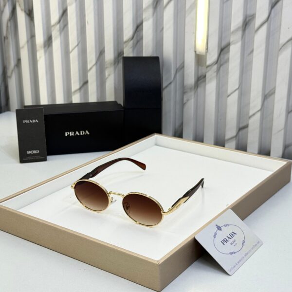 Prada Oval Women’s Sunglasses